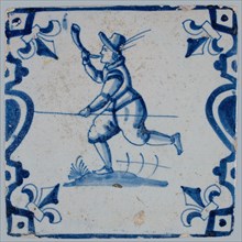 Figure tile, hunting scene, blue with float with hunting horn and stick, between balusters with lily, wall tile tile sculpture