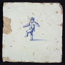 Figure tile, blue with man standing on one leg, arms wide, no corner motif, wall tile tile sculpture ceramic earthenware glaze