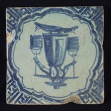 Figure tile, blue with woman with yoke with two buckets, on piece of land, in scalloped frame with accolades, corner motif