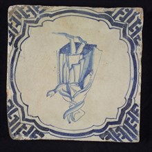 Figure tile, blue with nobleman with big hat and long coat, in scalloped frame with braces, corner motif meander, wall tile