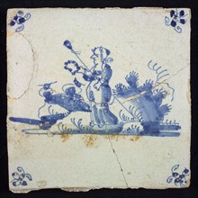 Figure tile, blue with landscape with standing shepherdess with garland and staff, corner motif spider, wall tile tile sculpture