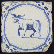 Animal tile, running ox to the left within frame of braces, in blue on white, corner motif, wing, wall tile tile footage ceramic