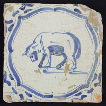 Animal tile, standing ox with curved head to the left within frame of braces, in blue on white, corner motif, wing, wall tile