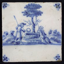Figure tile, blue with amorous shepherd scene with shepherd offering wreath to shepherdess, corner motif spider, wall tile