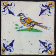 Animal tile, bird left on ground in orange, green, purple and blue on white, corner pattern french lily, corner point orange