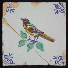 Animal tile, bird on ground in orange, brown, green and blue on white, corner pattern french lily, wall tile tile sculpture