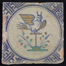 Animal tile, spotted bird on stick on the ground to the right in yellow, orange, green and blue on white, inside circle, corner