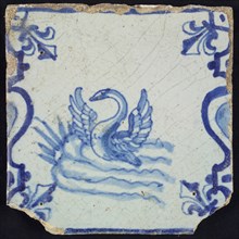 Animal tile, flying swan in water to the left between balusters in blue on white, corner pattern french lily, wall tile