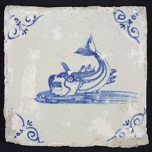 Animal tile, unknown fish in water to the left with open beak and curled tail, in blue on white, corner motif steered ox's head