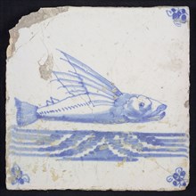 Animal tile, flying fish above running water to the right, in blue on white, corner motif spider, wall tile tile sculpture
