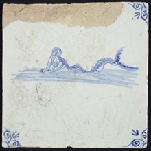 Sea creature tile, man with fish tail in water to the left, in blue on white, corner motif, ox-head, wall tile tile sculpture