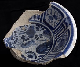 Fragment majolica bowl or saucer, blue on white, with bird in Chinese garden, rim in Wanli style, bowl dish crockery holder soil