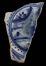 Fragment majolica dish, blue on white, with Chinese in landscape in circle with serrated edge, dish tableware holder earth