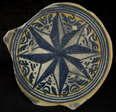 Fragment majolica dish, blue on white, details yellow, middle eight-pointed star, dish crockery holder soil find ceramic