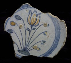 Fragment majolica dish, polychrome, tulip and stems on soil, plate crockery holder soil find ceramic earthenware glaze, baked