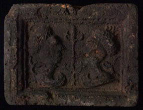 Hearthstone, Luiks, from Luik, Liege Belgium, with wide frame, with male and female head, hearth fireplace part ceramic brick