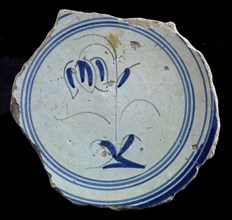 Fragment majolica dish, blue on white, simple tulip on ground, circled, plate dish crockery holder soil find ceramic earthenware