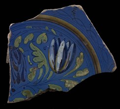 Fragment majolica dish, blue, yellow, green, white and purple on blue ground, foglie motif with tulips, dish plate crockery