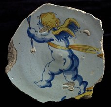 Fragment of the majolica dish, polychrome, plump Amor or Cupid with an arrow in his hand, plate dish crockery holder soil find