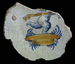 Fragment of the majolica dish, polychrome, Amor or Cupid on floating piece of ground, plate dish crockery holder soil find