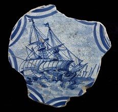 Fragment majolica dish, blue on white background, sailing ship on rough sea, plate dish crockery holder soil find ceramic