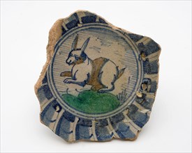 Fragment majolica dish, polychrome, jumping hare on piece of land, niches In the border, plate dish crockery holder soil find