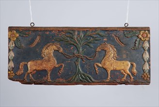 Wooden painted back plate of farm wagon, with image two gilded horses tied to tree, back crate wood carving sculpture footage