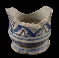 Fragment majolica albarello, ointment jar, polychrome decoration on white background, albarello holder earthenware pottery
