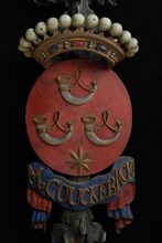 Carved wooden ornament with four crowned coats of arms, coat of arms information form carvings sculpture footage wood paint gold