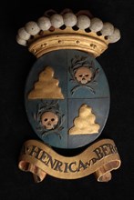Carved wooden crowned coat of arms including the name . Henrica vd Berg, coat of arms informative form carvings sculpture
