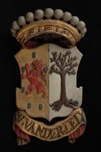 Carved wooden crowned coat of arms including the name W. Van der Lely, coat of arms information form carvings sculpture footage