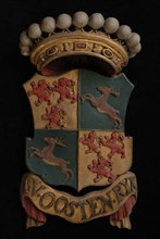 Carved wooden crowned coat of arms including the name I.V. Oostenryk, coat of arms informative form carvings sculpture sculpture