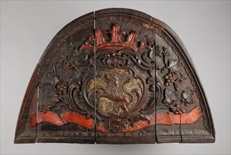 From house on the Vogelenzang, Rotterdam, standing lion above banderole with inscription 1765, wood-carving sculpture wood