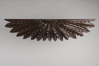 Carved wooden ornament consisting of elongated leaves in fan shape, ornament wood carving sculpture footage wood