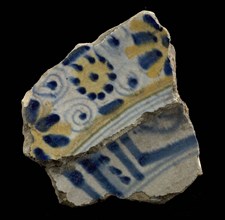 Fragments of two stuck majolica plates, lower Chinese tape border, upper aigretrange, plate crockery holder soil find ceramic