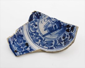 Fragment faience plate, blue on white, Chinese decor with landscape and tendrils, plate crockery holder soil find ceramic