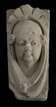 Keystone with gable head, female head with cap, keystone gable ornament building component limestone stone, sculpted Above wider