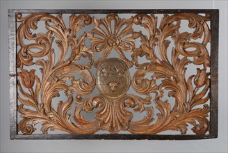 Skylight with carved leaf motifs, curly around coat of arms of the De Man family, cutting frame, toplight, carvings, sculptural