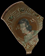 Fragment Werra plate, mirror finish bust of man, year 1621, pale yellow and green glaze, edge decor voluten, plate crockery