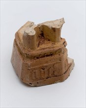 Fragment of pedestal of pipe sculpture with AVE M, sculpture visual material soil finds ceramic pipe earth, in mold formed baked