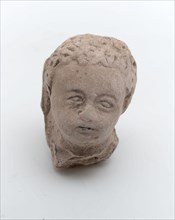 Part of pipe image, child's head, sculpture visual material soil finds ceramic pipe earth, in mold formed baked Children's head