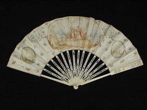 Folding fan with carved ivory frame and multicolored painted parchment leaf with rococo motifs and pastoral scene, folding fan