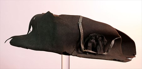 Black felted two-sided stitch, bicorne, with ribbon and black cockade, three bullet holes in upright front and back flap