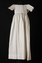 Baby dress or white cotton dress with pleated long, long skirt, drawstring through the waist and neck, needle pleats, embroidery