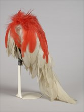 Plume or panache, white rooster feathers with red top on metal wire in silver setting, uniform element tambour Major Schutterij