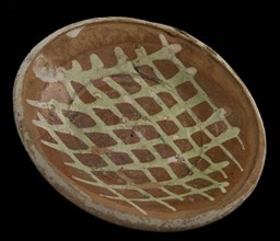 Pottery plate, waffle plate with white silt decoration, plate dish crockery holder soil find ceramic earthenware glaze lead