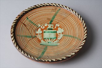 Earthenware plate with white mud decoration and green stripes, sgraffito, dated 1607, plate dish crockery holder soil find