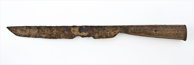 Knife with elongated iron blade and wooden handle, consisting of two plates, knife cutlery soil find iron wood metal, archeology