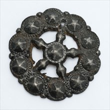 Rosette, consisting of radial frame with pearl edge around five-pointed star, fitting jewelery clothing accessories clothing
