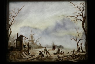 Perspective box made of black lacquered wood with three painted glass plates: ice picture with spring house and windmill